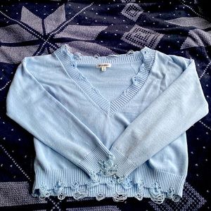 Blue vintage v-neck knitted 90s streetwear aesthetic